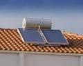 Solar water heater on roof of house Royalty Free Stock Photo