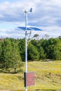 Solar and wind power lamp under clear sky