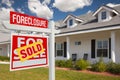 Sold Foreclosure Real Estate Sign and House - Left Royalty Free Stock Photo