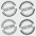 Sold here insignia stamp isolated on white. Royalty Free Stock Photo