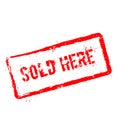 Sold here red rubber stamp isolated on white. Royalty Free Stock Photo