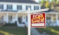 Sold Home For Sale Real Estate Sign in Front of Beautiful New Ho Royalty Free Stock Photo