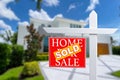 Sold Home For Sale Real Estate Sign in Front of Beautiful New House. Royalty Free Stock Photo