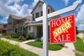 Sold Home For Sale Real Estate Sign in Front of Beautiful New House. Royalty Free Stock Photo