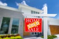 Sold Home For Sale Real Estate Sign in Front of Beautiful New House. Royalty Free Stock Photo