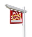 Sold Home For Sale Real Estate Sign Isolated on a White Background with Transparent PNG Option. Royalty Free Stock Photo