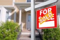 Sold Home For Sale Sign in Front of New House. Royalty Free Stock Photo