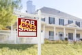 Sold Home For Sale Sign in Front of New House Royalty Free Stock Photo