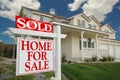 Sold Home For Sale Sign & Home Royalty Free Stock Photo