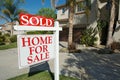 Sold Home For Sale Sign & Home Royalty Free Stock Photo