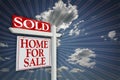 Sold Home For Sale Sign on Sky Royalty Free Stock Photo
