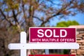 SOLD With Multiple Offers real estate sign near purchased house indicates hot seller`s market in the desired neighborhood Royalty Free Stock Photo