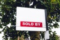 Sold property, sign near a house, UK Royalty Free Stock Photo