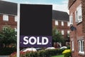 Sold property, sign near a house, UK Royalty Free Stock Photo