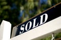 Sold sign in front of house or condo Royalty Free Stock Photo