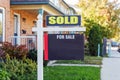 Sold sign in front of a house Royalty Free Stock Photo