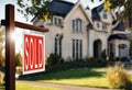 a sold sign is shown in front of a new home Royalty Free Stock Photo