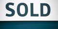 Sold sign in blue letters Royalty Free Stock Photo