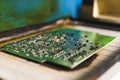 Solder reflow furnace attaching many tiny electrical components to their contact pads. Modern electrical and electronic