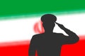 Solder silhouette on blur background with Iran flag