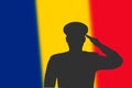 Solder silhouette on blur background with Romania flag