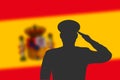 Solder silhouette on blur background with Spain flag