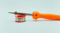 Solder wire and soldering iron with white background Royalty Free Stock Photo