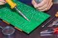 Soldering on circuit board Royalty Free Stock Photo