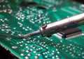 Soldering on an electronic circuit board Royalty Free Stock Photo