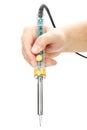 Soldering iron in hand Royalty Free Stock Photo