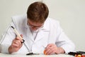 Soldering iron in his hand Royalty Free Stock Photo