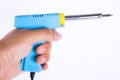 Soldering iron in his hand Royalty Free Stock Photo