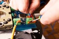 Soldering process on a green PCB closeup Royalty Free Stock Photo