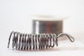 Soldering tin in focus on the white background Royalty Free Stock Photo