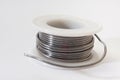 Soldering tin on a white background Royalty Free Stock Photo