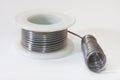Soldering tin on a white background Royalty Free Stock Photo