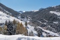 Soldeu, Canillo, Andorra on an autumn morning in its first snowfall of the season. You can see almost completed the works of the t Royalty Free Stock Photo