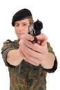 Soldier aiming with gun