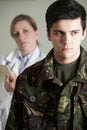 Soldier Being Assessed By Doctor