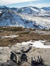 Soldier with binoculars on the top of a mountain Royalty Free Stock Photo