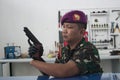 Soldier With Bionic Hand In Indonesia Royalty Free Stock Photo