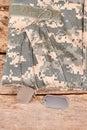 Soldier camouflage clothes and dog tags.