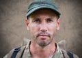 Soldier face with grunge overlay against brown background