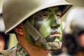 Soldier Face Painted In Green