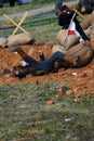 A soldier falls down. Osovets battle reenactment