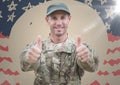 Soldier giving two thumbs up against hand drawn american flag with flare Royalty Free Stock Photo