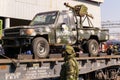 Soldier guarding themobile exhibition of trophies of the Russian army during the Syrian campaign