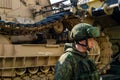 Soldier guarding themobile exhibition of trophies of the Russian army during the Syrian campaign