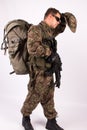 Soldier with gun and backpack