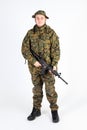 A soldier with gun in USMC MARPAT camo